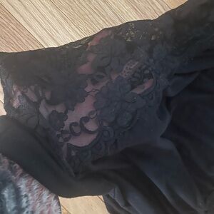 One sleeve black top with lace down both sides
